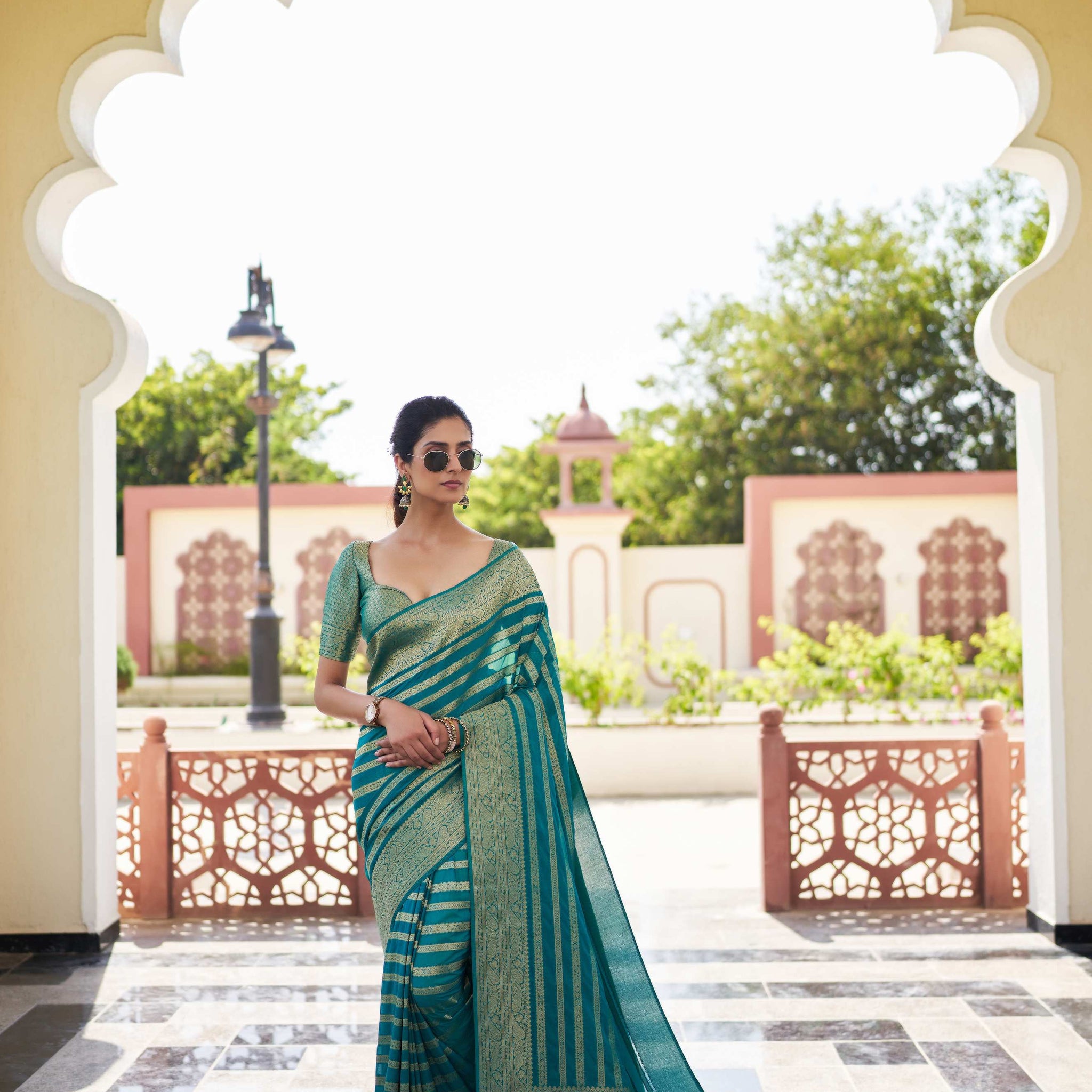 Teal Blue Pure Georgette Saree