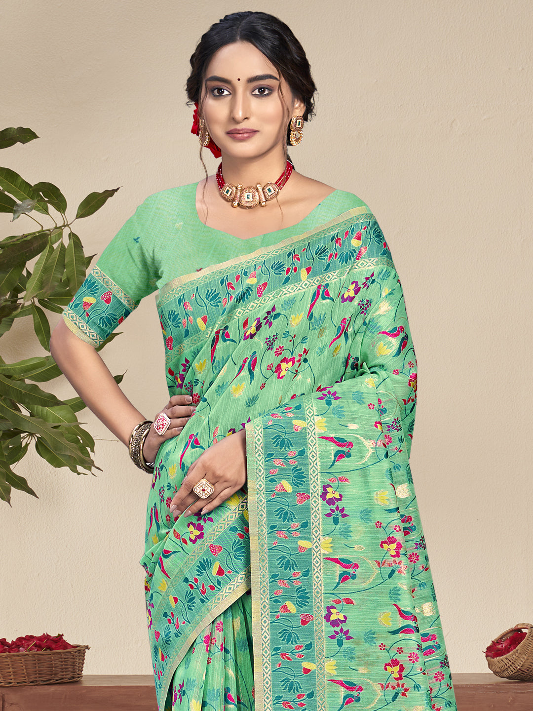 Pista Green Silk Saree With Attractive Floral Work