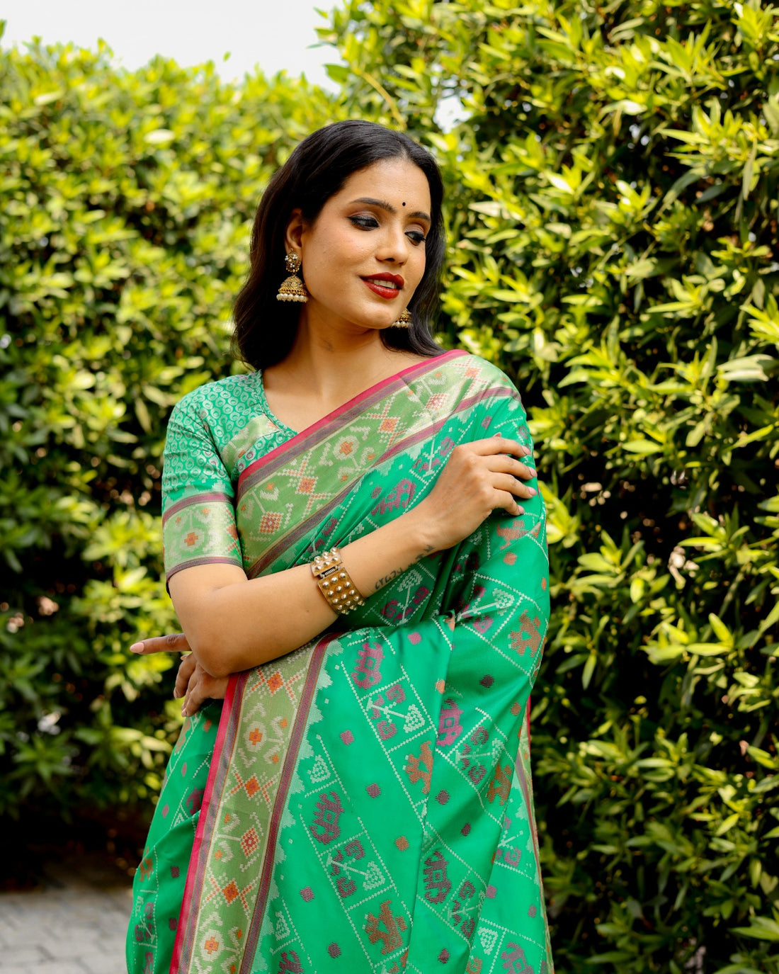 Teal Green Ikkat Patola Silk Saree