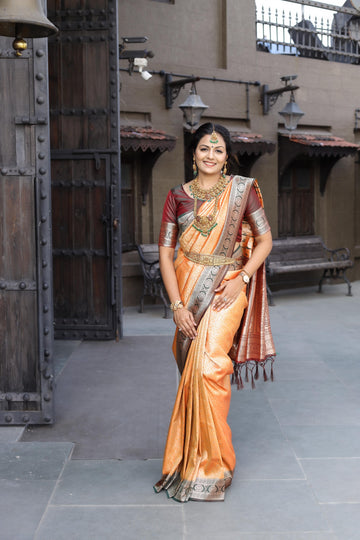 Light Orange Soft Silk Saree With Exclusive Maroon Border