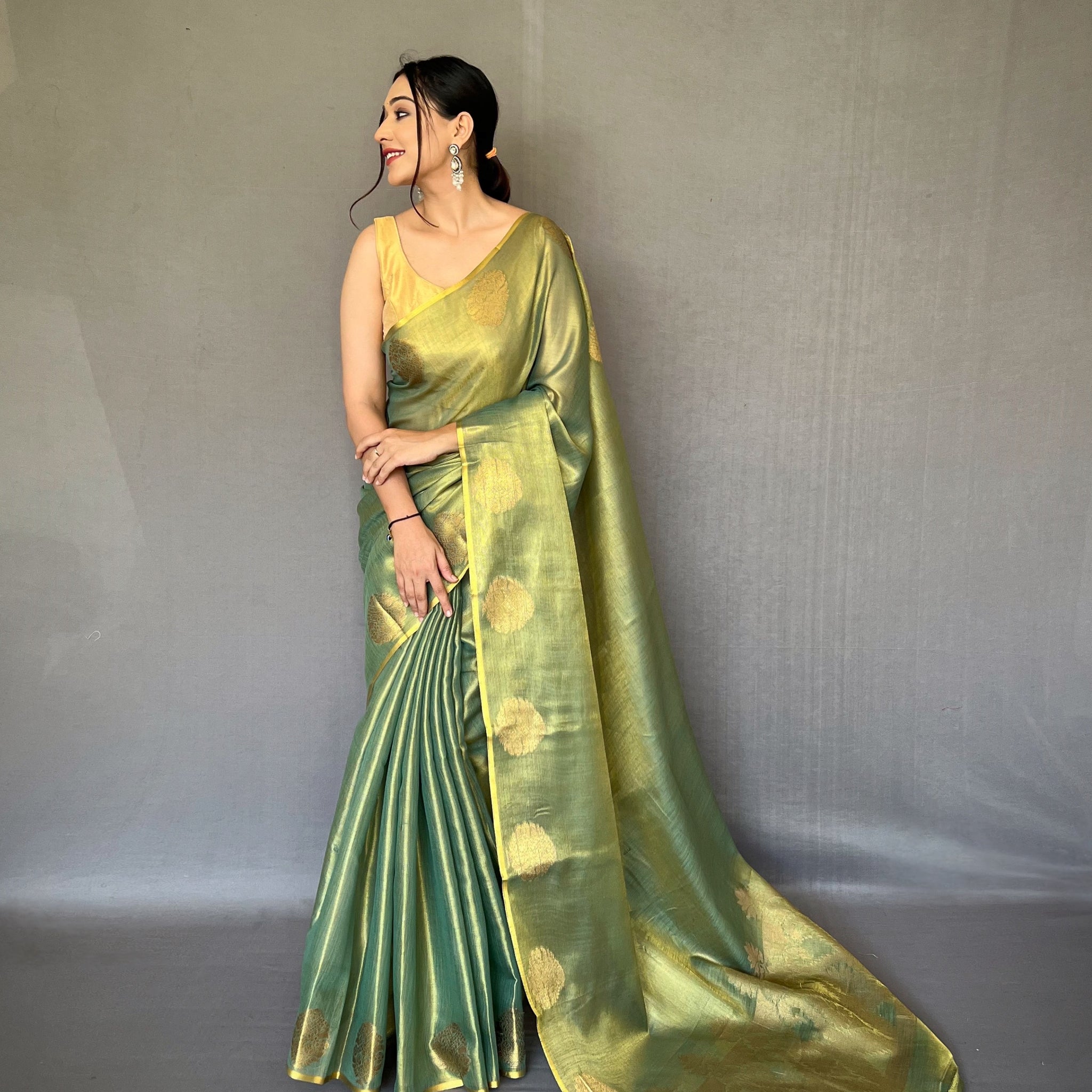 Dark Green Tissue Silk Saree